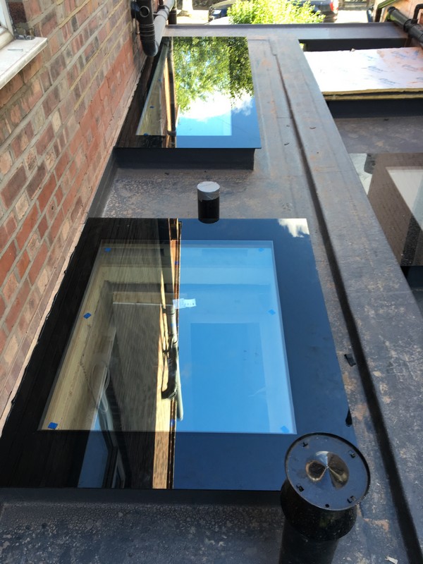 Multiple flat roof skylights on extension in Bletchley