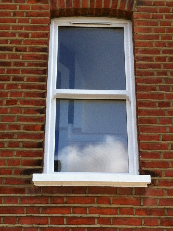 uPVC sash window on Victorian red brick house in Bletchley